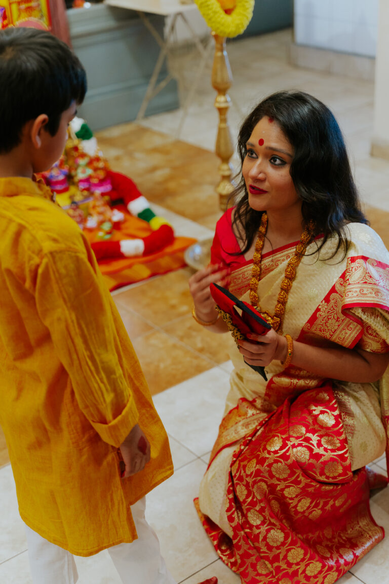Student receiving Salangai from Stuti at Sivan temple on the occasion of Vijaydashami